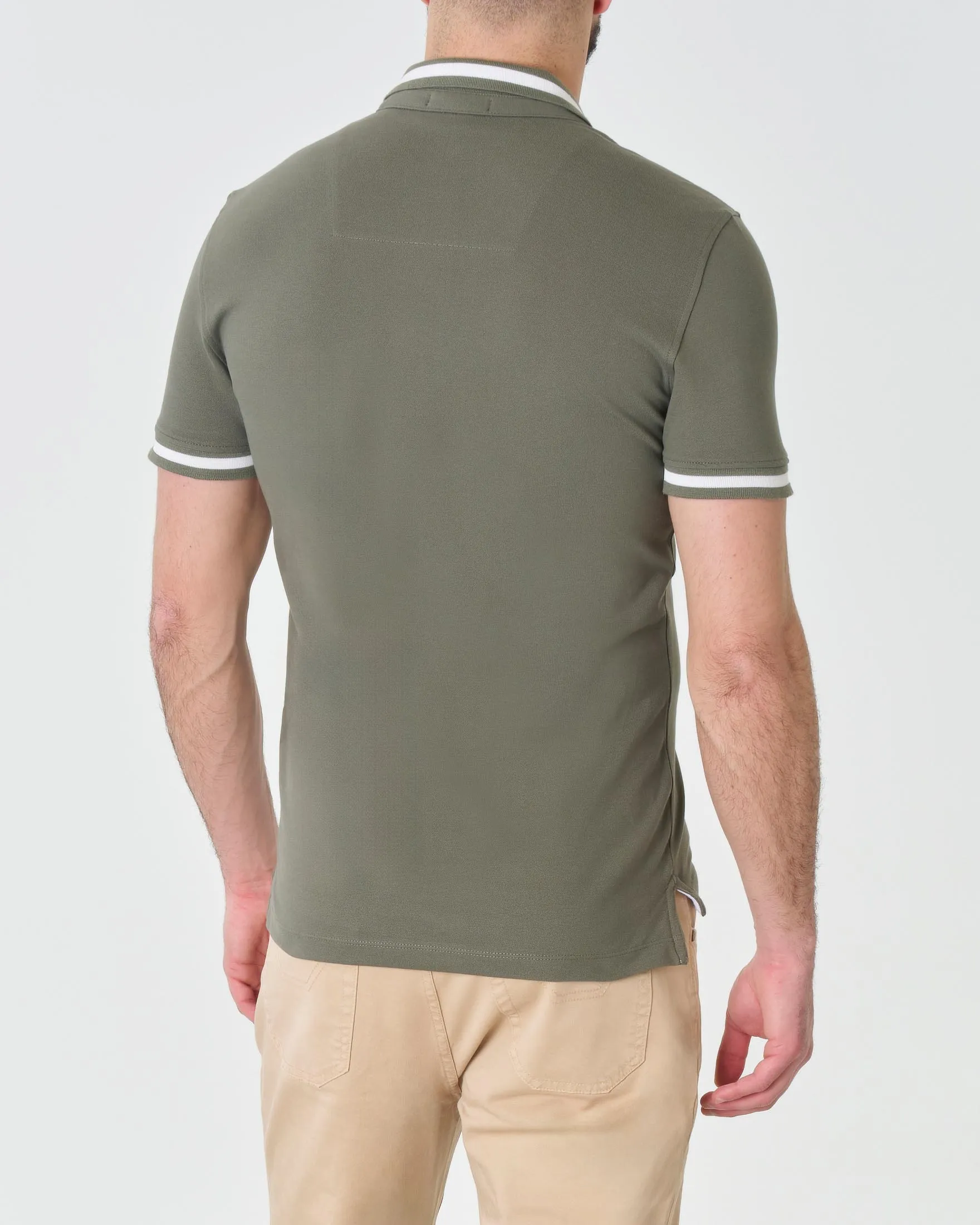 Polo verde militare in piqué di cotone stretch con bordino bianco e logo ricamato al petto