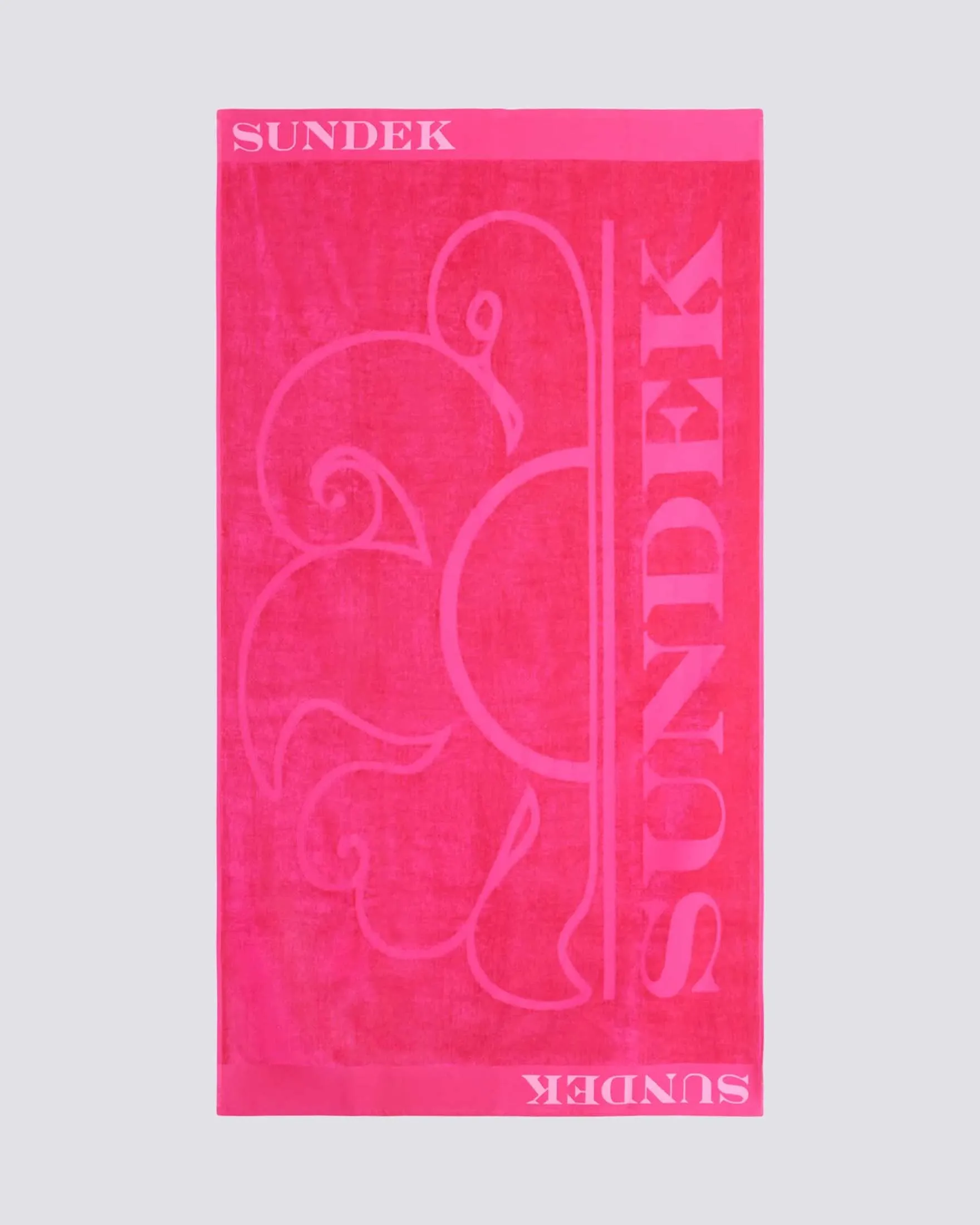 Telo mare fucsia in spugna di cotone con fondo bicolore e scritta logo verde scuro