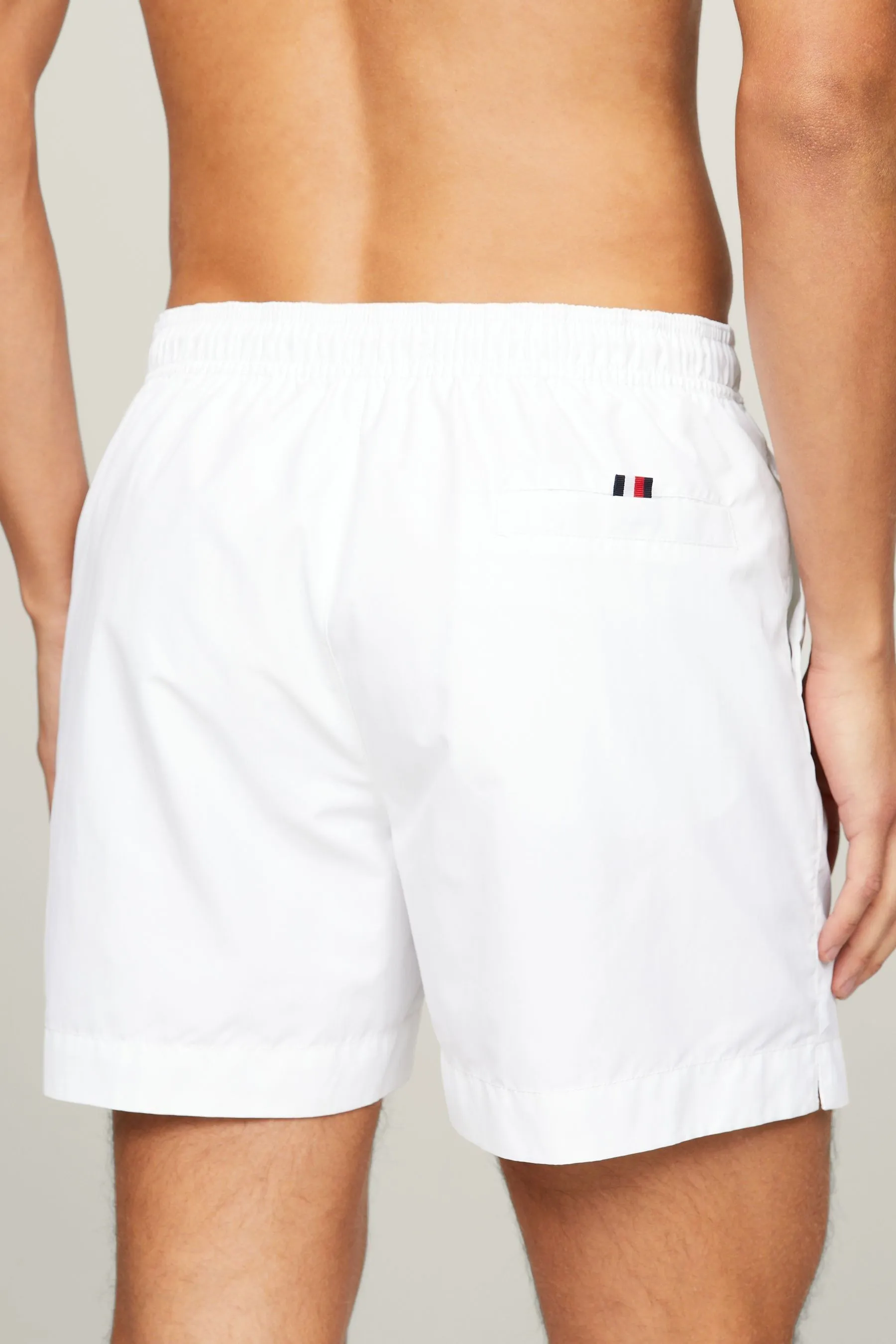 Tommy Hilfiger - Shorts da bagno media con logo e coulisse    
